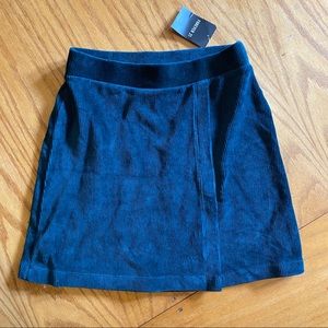 Emerald green velvet skirt